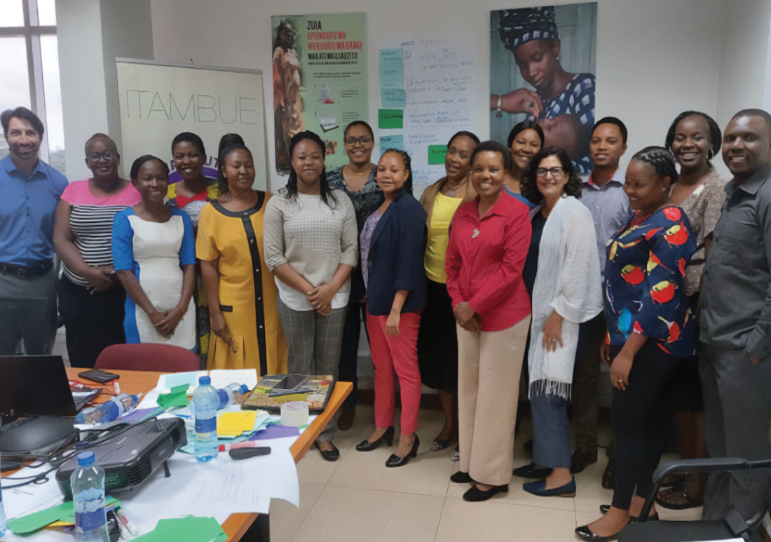 TFNC participants taking a group photo with USAID Advancing Nutrition facilitators.