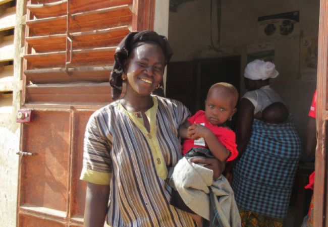 Woman with her child in Senegal