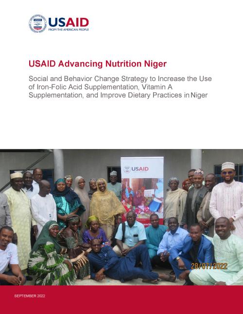 Group photo of the USAID Advancing Nutrition Niger team in front of a USAID banner